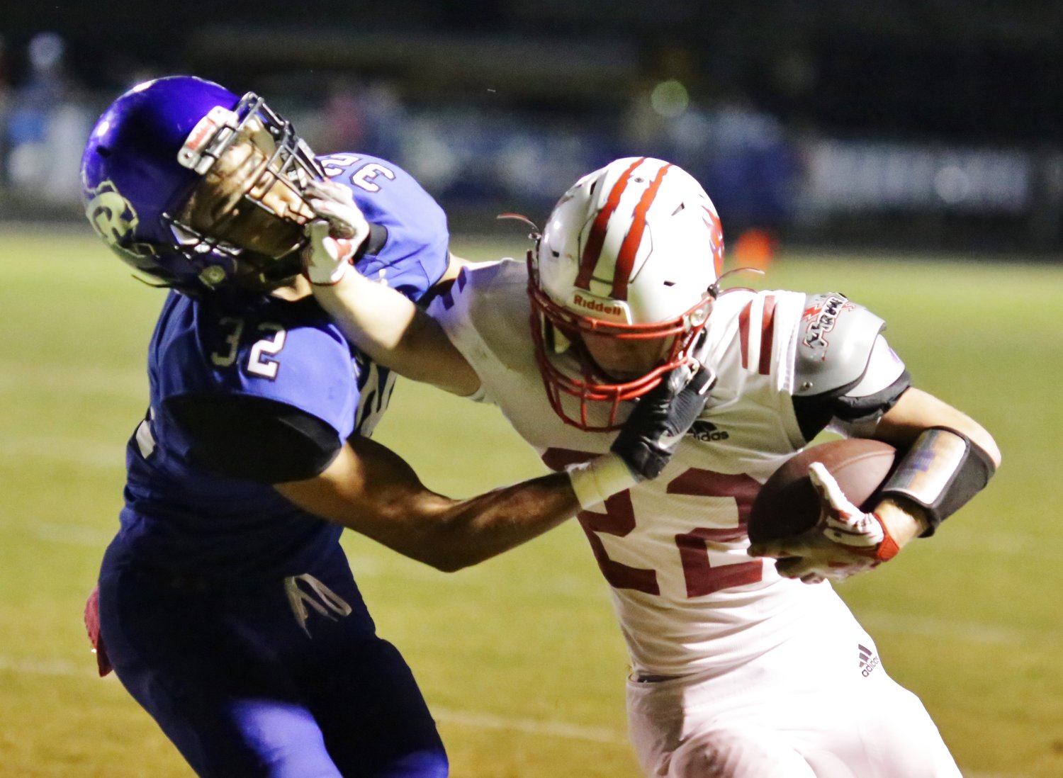 Alba-Golden’s Glen Hartley, demonstrating a stiff-arm, ran with abandon in Friday’s win against Rivercrest.